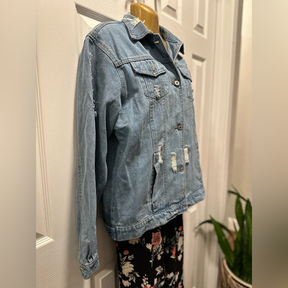 Denim jacket. Size medium. Distressed. Loose fit. - Picture 9 of 11